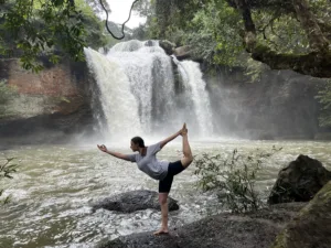 Yoga pose waterfall Thailand