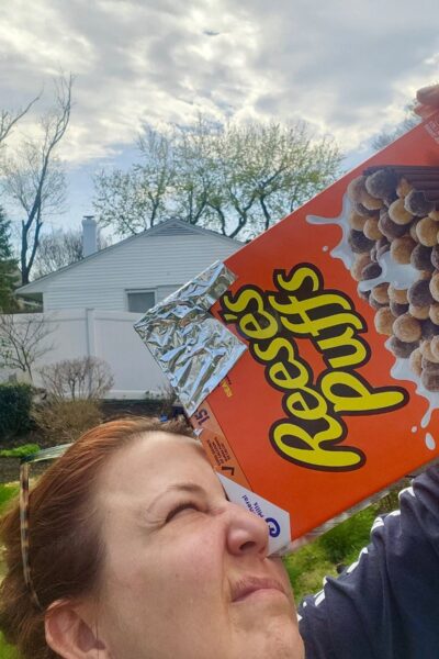 Jessica watching solar eclipse with cereal box