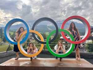 Olympic Rings in Cortina, Italy with mountain backdrop